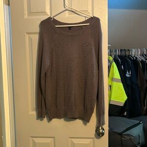 super comfy sweater with hearts scattered across front
